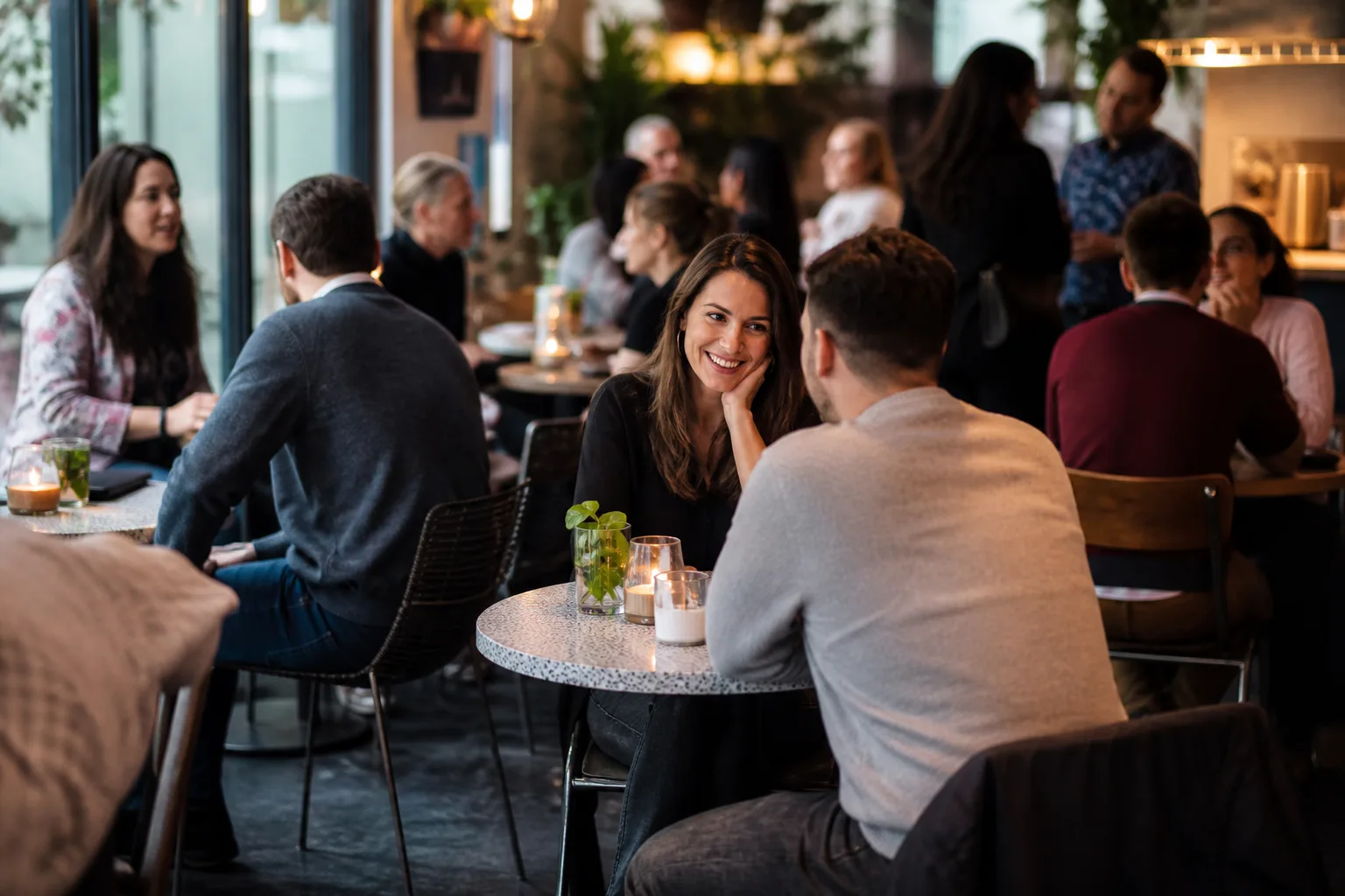 Single adults chatting at a relaxed local social event in County Londonderry